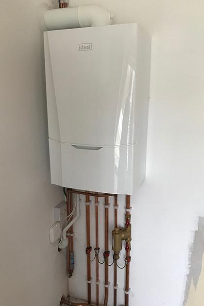 New Ideal Vogue boiler installation in Saltdean. This boiler replacement has a 12 year manufactures warranty